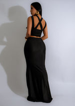 
The Twisted Elegance Skirt Set Black, a versatile and elegant ensemble perfect for formal events or a night out, offering a modern twist on classic black attire