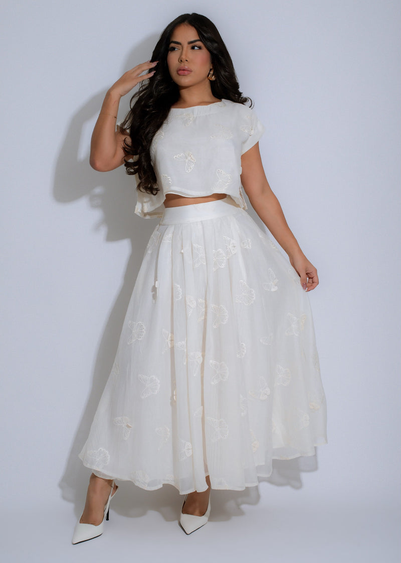 Beautiful white lace skirt set with butterfly meadow design, perfect for summer