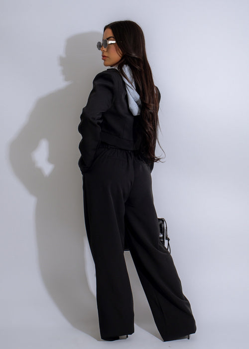 Chic and versatile, the City Luxe Layered Pant Set Black is the perfect ensemble for modern city life, offering a sophisticated look with its layered top and black pants