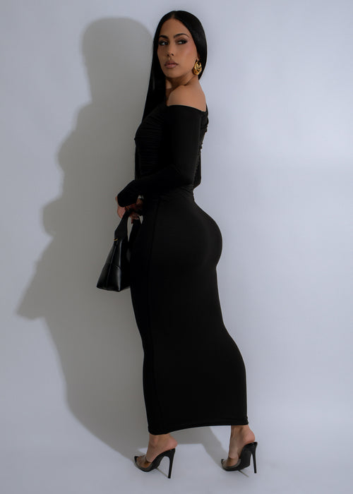 Gorgeous black maxi dress with ruched detailing and elegant design