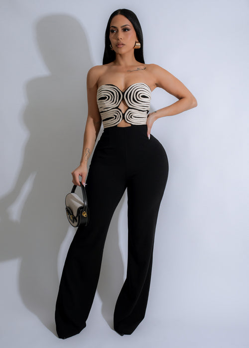 Spiral Seduction Jumpsuit Black: A sleek and sexy black one-piece jumpsuit with a plunging neckline and spiral detailing on the bodice, perfect for a night out or special occasion