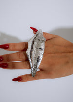 Close-up image of the Solaris Lips Statement Ring Silver, featuring a bold, silver design with intricate detailing and a striking, statement-making style