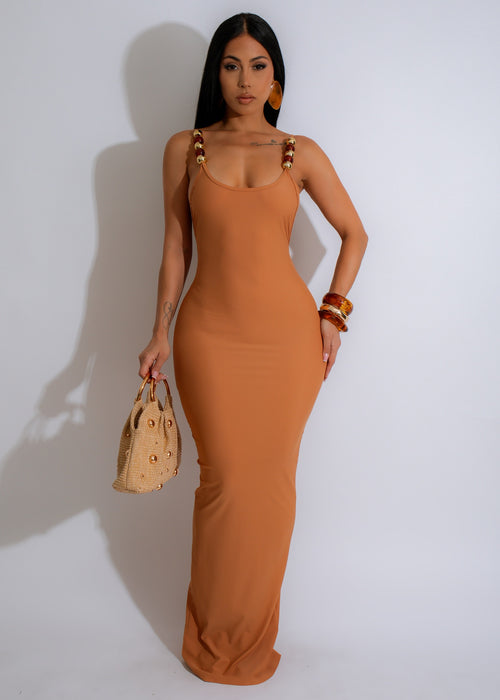  Elegant and flowy brown dress with shimmering accents for special occasions