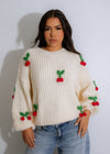  Stylish cherry pop sweater knit featuring a cozy and comfortable design