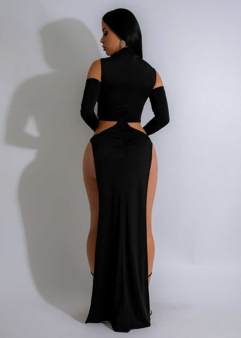 Elegant and glamorous black maxi dress with stunning rhinestone embellishments