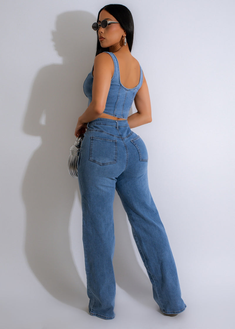 Two-piece set in light denim, including a relaxed fit pant and matching long sleeve top