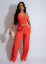 Serene Ripple Pant Set in vibrant orange color with matching top