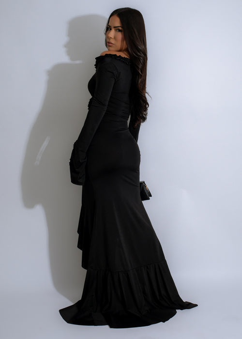  Close-up of the luxurious fabric and intricate ruched design of the Scarlet Rhapsody Ruched Maxi Dress in timeless black, showcasing its high-quality construction and stunning, figure-enhancing style