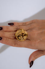 Alt text: Shimmering Molten Glow Ring in Gold, a stunning and radiant jewelry piece with a unique molten design