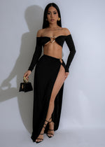 Full-length flowing black skirt set with crimson red detailing and elegant design