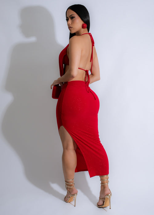 Two-piece set including a radiant red sparkle skirt and matching top with ruched design