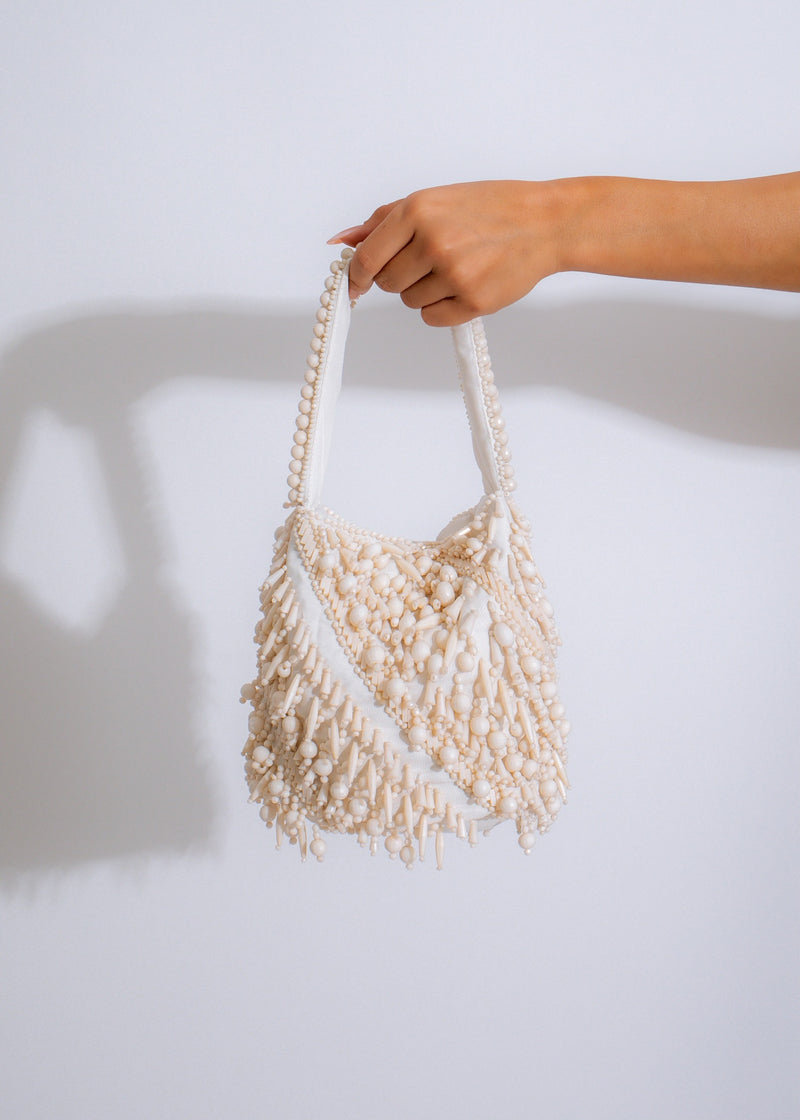 Stylish nude beaded elegance bag with intricate detailing and elegant design