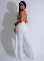 Fashionable and eye-catching pants featuring crystal drape rhinestones in white
###