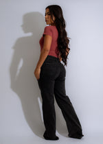  Front view of vintage black high rise jeans with a trendy and versatile style