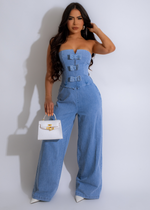 The Bow-Front Jumpsuit Light Denim featuring a light denim color and flattering bow-front design for a chic and trendy look