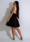 Stunning black linen mini dress with adjustable straps and flattering silhouette