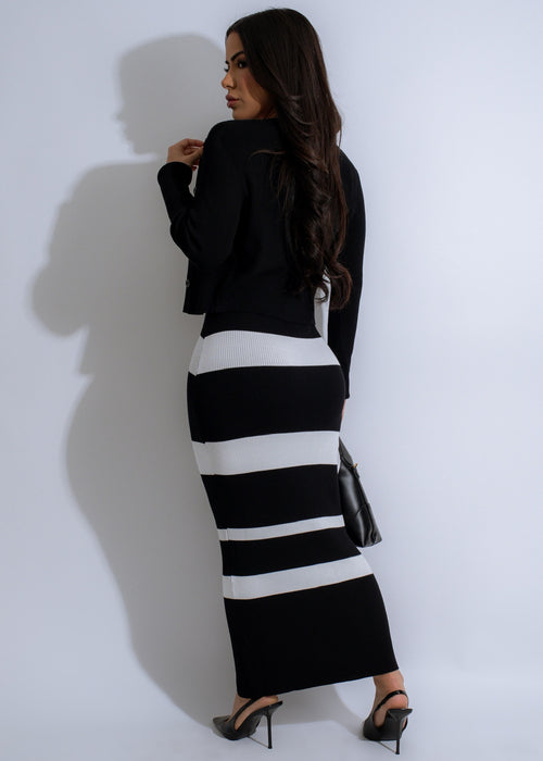 Alt text: Eclipse Current Ribbed Striped Maxi Dress Black, a stylish and versatile dress perfect for any occasion