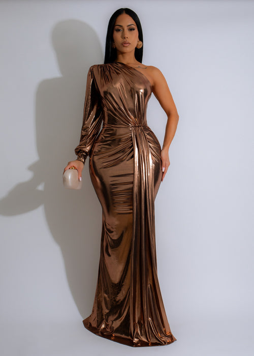 Shimmering gold metallic ruched maxi dress with a gilded glow