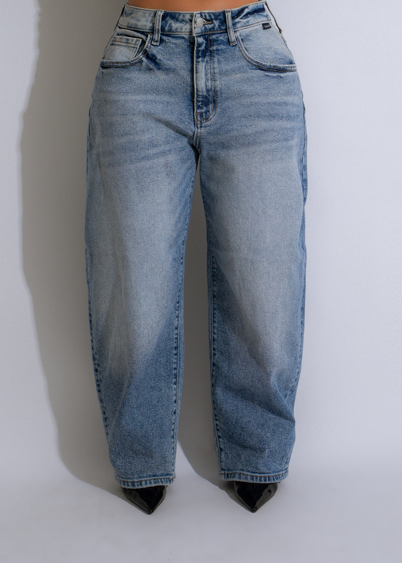  Side view of Free Looks Jean Light Denim showcasing the light wash and slim fit