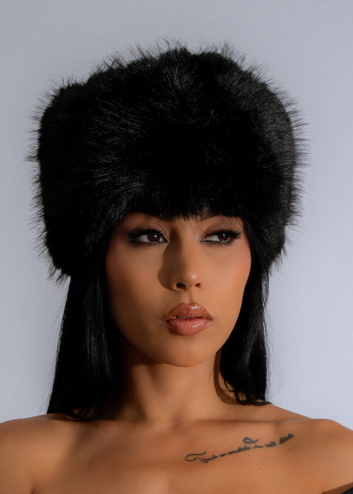 Stylish and cozy Luxe Winter Whisper Faux Fur Hat in elegant black color for cold weather fashion