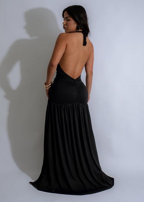 Alt text: Elegant and versatile Nocturnal Flow Ruched Maxi Dress in classic black