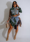 Rustic Remix Skirt Set Green: A stylish, bohemian-inspired two-piece outfit featuring a flowy green skirt and a matching crop top with eye-catching rustic design elements