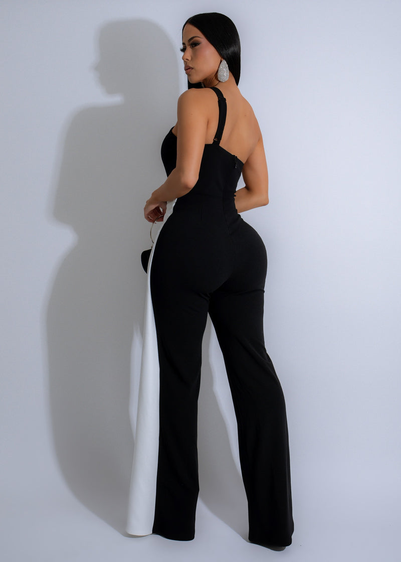 Stunning black jumpsuit adorned with rhinestones for a glamorous style