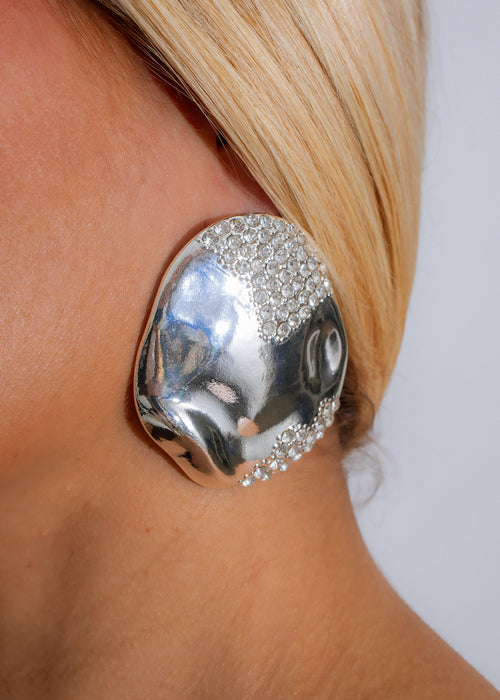 Shimmering silver Stellar Cascade Earrings, a stunning accessory for any occasion