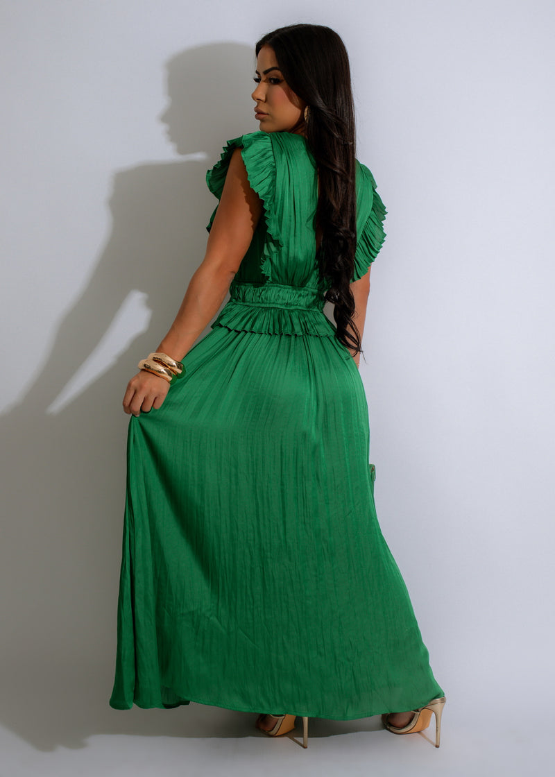 Elegant and flowy green maxi dress with a cascading ruffle hem, designed for a flattering and stylish look