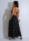 Alt text: Elegant and versatile Midnight Whimsy Midi Dress in classic black color