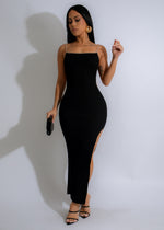 Alt text: Elegant and versatile, the Endless Nocturnal Ribbed Maxi Dress in sleek black offers a figure-flattering silhouette for evening events and special occasions