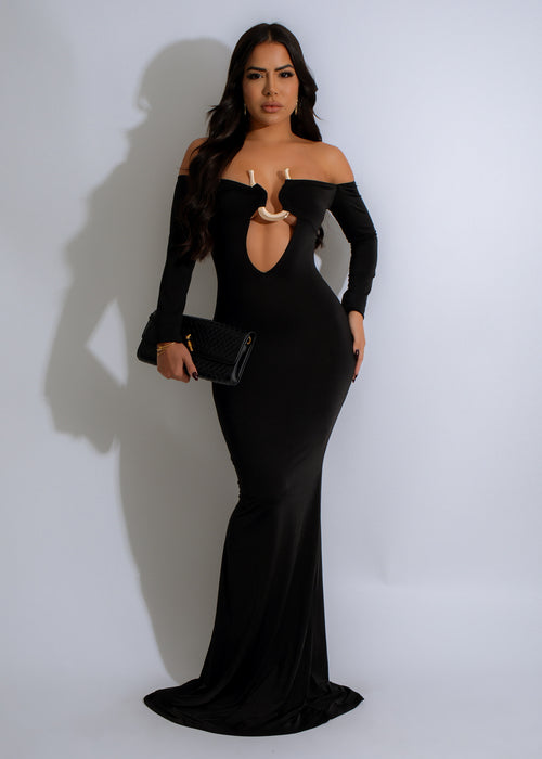 Close-up of elegant black Midnight Eclipse Maxi Dress with lace detailing and plunging neckline