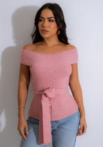 A soft and comfortable pink knit top, perfect for cozy days