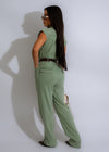 Stylish and versatile sage utility jumpsuit with a flattering silhouette and functional design