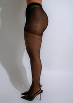 Black panty hose tights with elegant dotted design and stretchy fabric