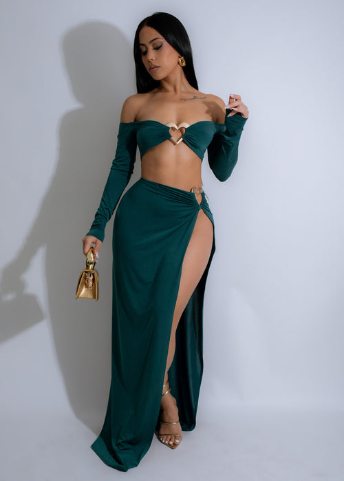 Crimson Aura Skirt Set Green, a vibrant and flowy two-piece outfit with a high-waisted skirt and matching top, perfect for a stylish and chic look for any occasion