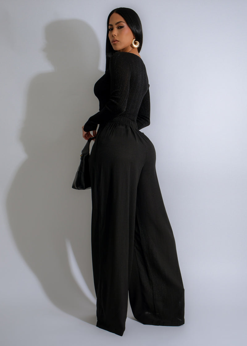 Close-up of black linen pant set with ribbed texture and flowy silhouette