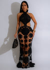 Stunning black crochet maxi dress with a flowing silhouette and golden hour vibes