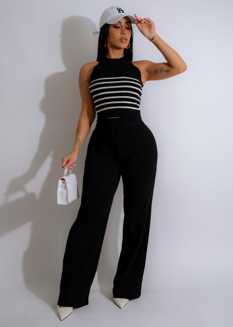 Black nautical chic pant set featuring a stylish and elegant design