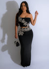 Black skirt set with shimmering crystal bloom rhinestones, perfect for evening wear