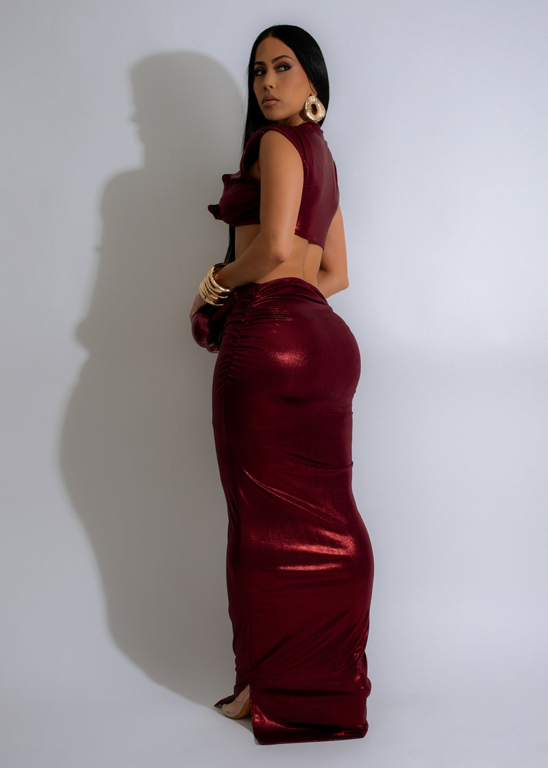  The Molten Desire Ruched Skirt Set Red features a flattering ruched skirt and matching crop top, designed to make you stand out and feel confident