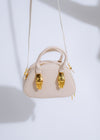 Alt text: Ethereal Grip Handbag Nude, a stylish and luxurious accessory for carrying essentials