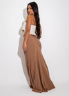  The Desert Drift Linen Skirt Set Nude* displayed on a stylish model, featuring a flowy and breathable linen fabric, perfect for a bohemian and elegant look in warm neutral tones