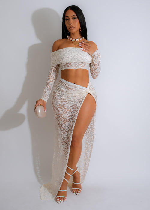 Beautiful white lace skirt set with matching top and intricate detailing