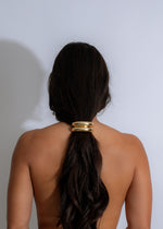 Close-up of Luxe Loop Hair Tie Gold with delicate etched design