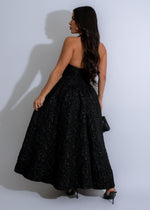 Stunning Midnight Bloom Floral Maxi Dress Black featuring a flattering V-neck and adjustable spaghetti straps