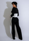 An image of the Weekend Harmony Knit Stripes Pant Set in Black, a comfortable and stylish loungewear option for relaxing at home or running errands