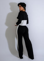 An image of the Weekend Harmony Knit Stripes Pant Set in Black, a comfortable and stylish loungewear option for relaxing at home or running errands