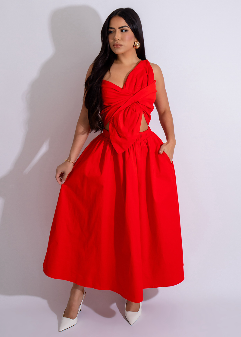 Beautiful red botanical bow midi dress with elegant floral print and adjustable tie waist detail, perfect for any special occasion or event