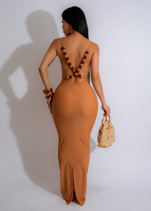 Beautiful brown maxi dress with sparkly details perfect for sunset events